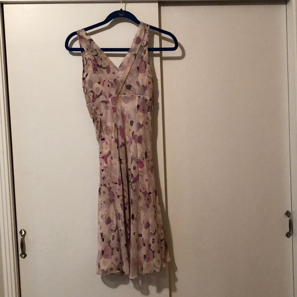 Express floral dress with silk in the inside.